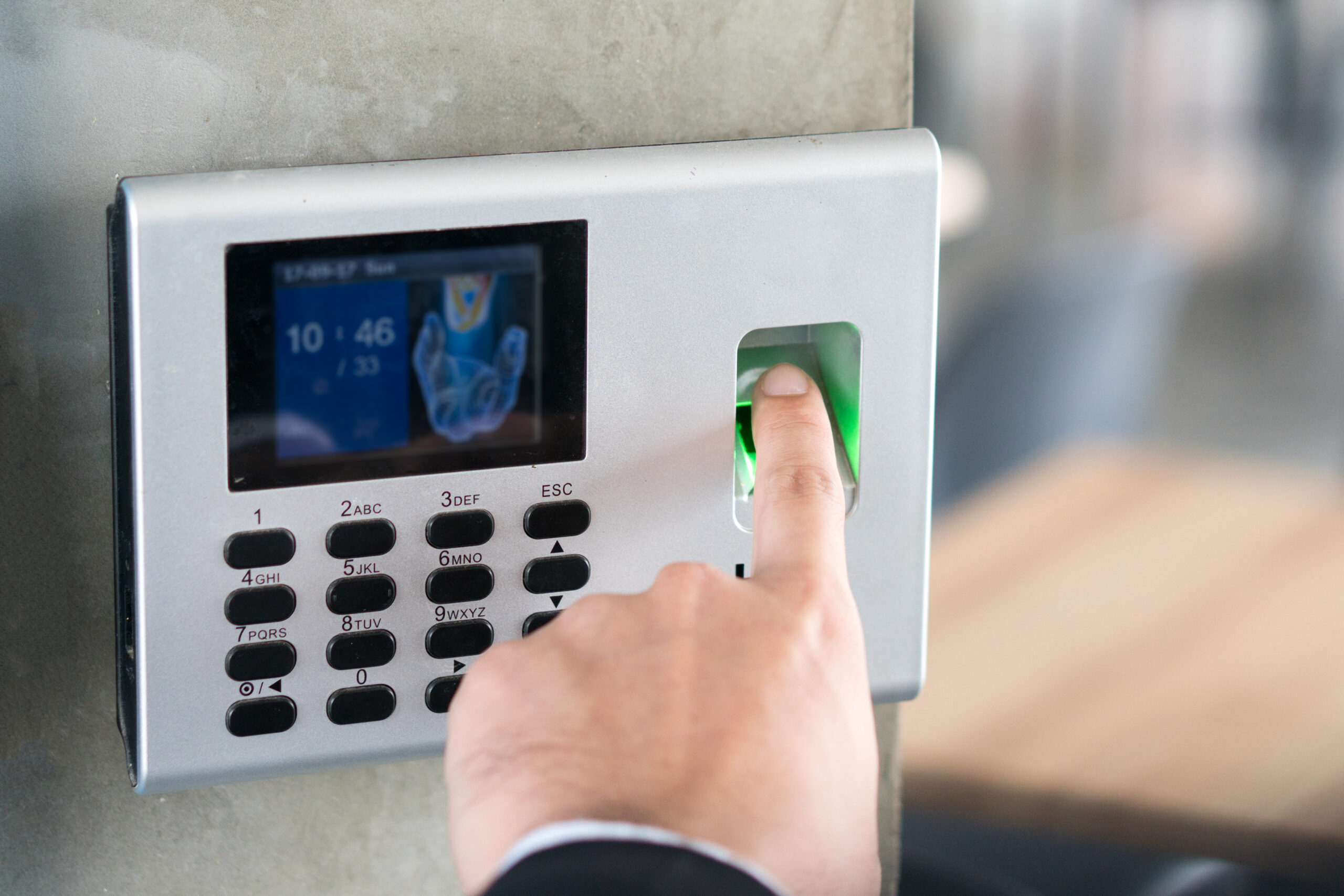 Employee Scanning Fingerprint Record Hours Work Time